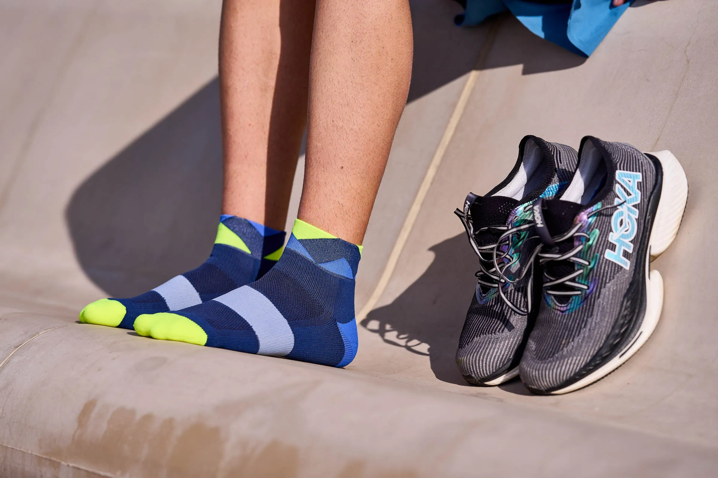 INCYLENCE RUNNING PEAKS SHORT NAVY BLUE CANARY