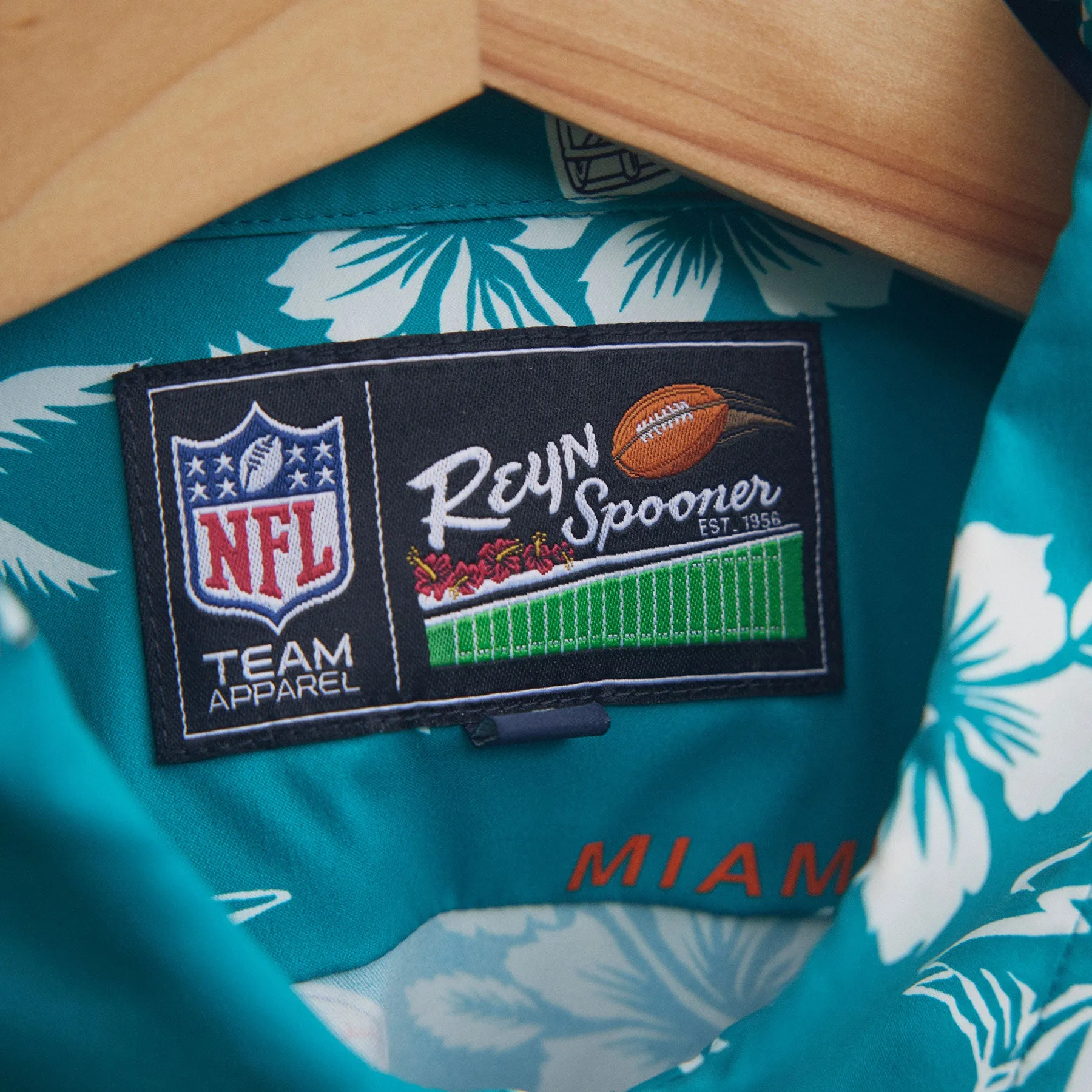 MIAMI DOLPHINS KEKAI PERFORMANCE BUTTON FRONT
